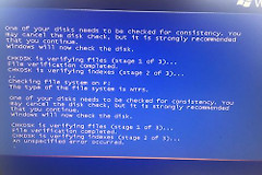 移动硬盘装的win7启动时蓝屏怎么办